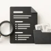 A CV document with a magnifying glass, evidence folder and gold paperclip.