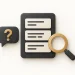 A charcoal backlog board beside a magnifying glass and question bubble.