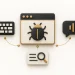 A browser panel with a bug symbol connected to a keyboard, a speech bubble and an evidence note under a magnifying glass.