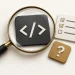 Code brackets under a magnifying glass beside a test checklist.